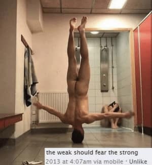 The meme features a photo of a person in a awkward or uncomfortable situation, likely in a public restroom. The text overlay at the top of the image reads "the weak should fear the strong".